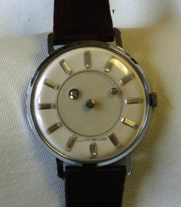 louvic mystery dial watch